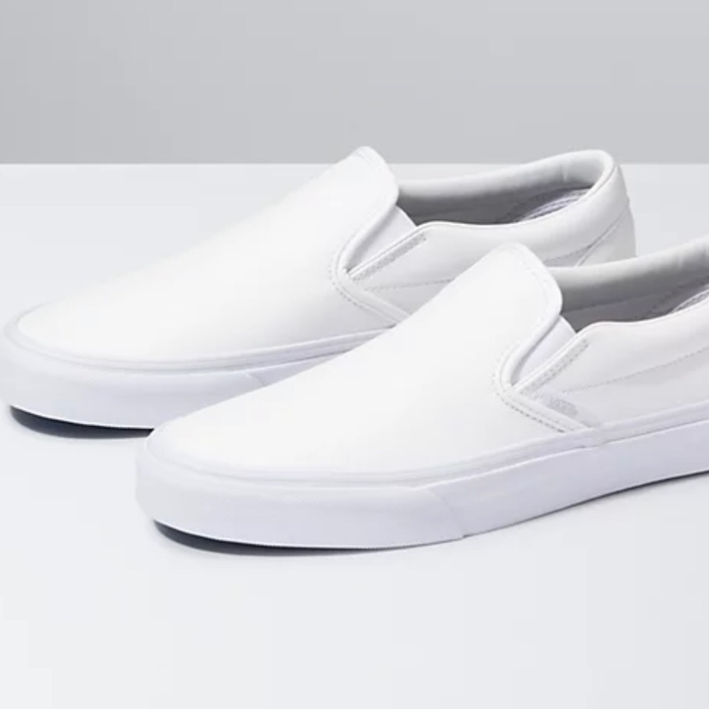 White slip on vans